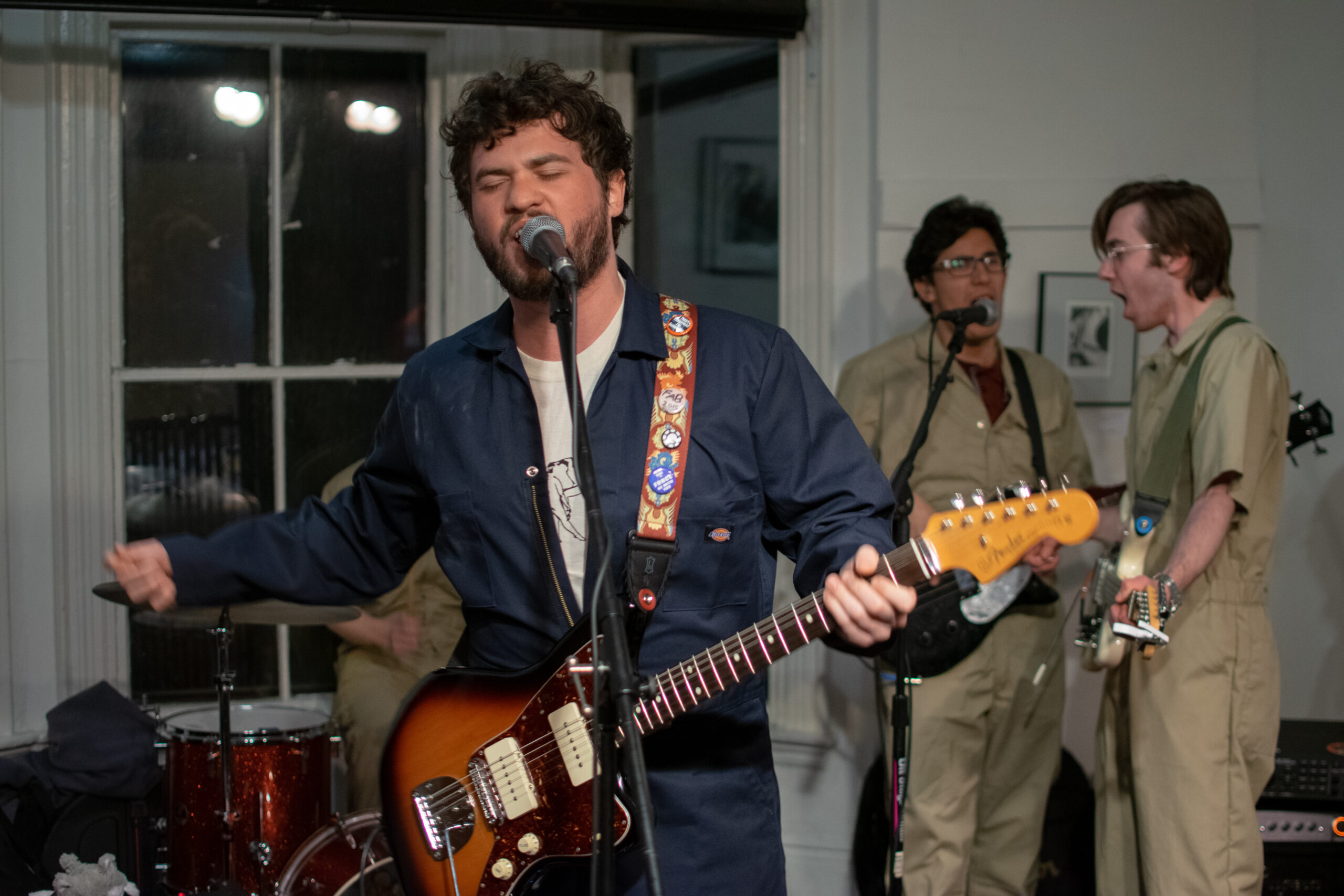 Members of local rock band Runnerup great the crowd with explosive energy as they open a show at Outpost 186 (2019)