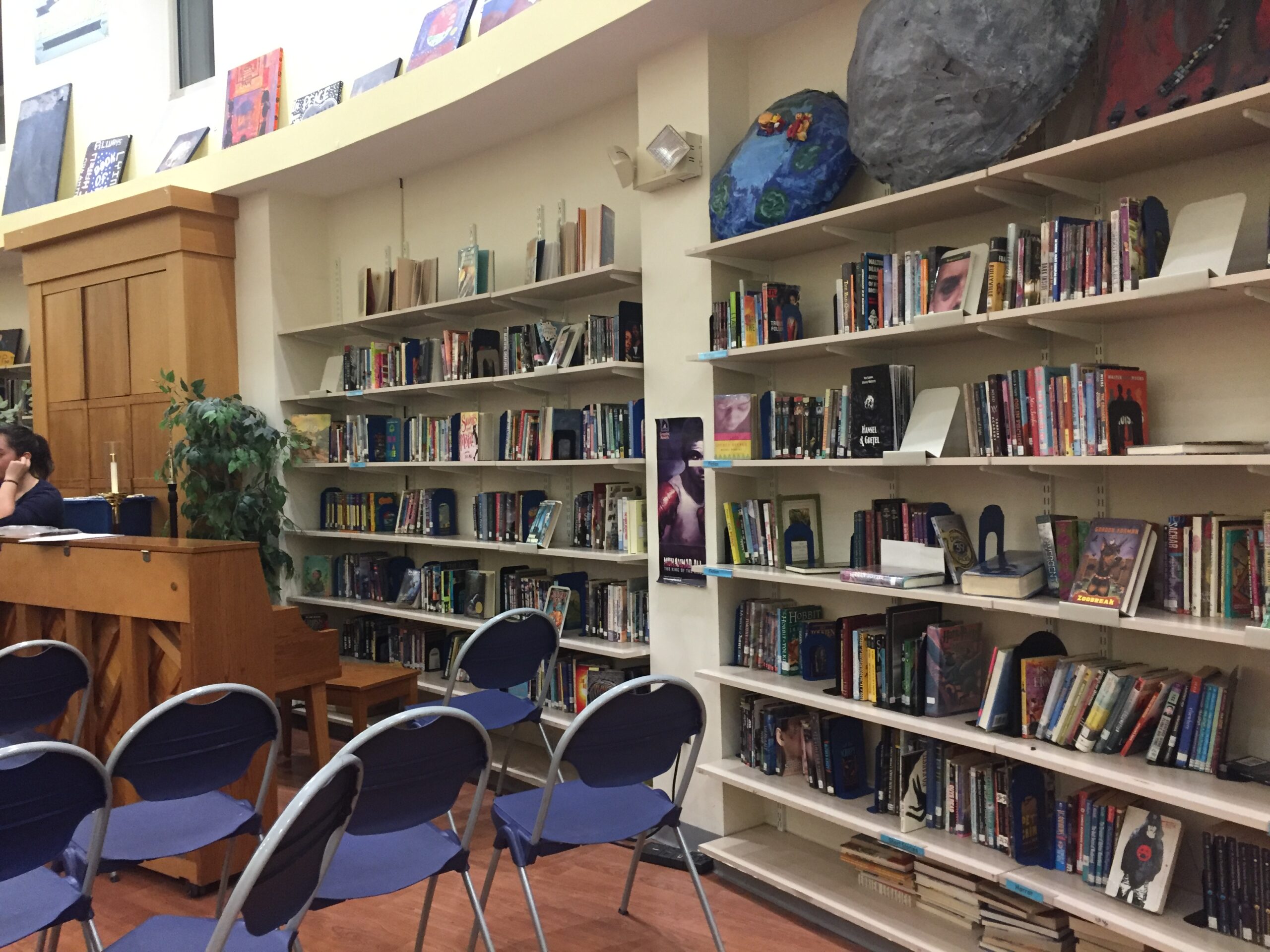 IMG_2131 <em>Books line the rehearsal room in the Epiphany School</em>